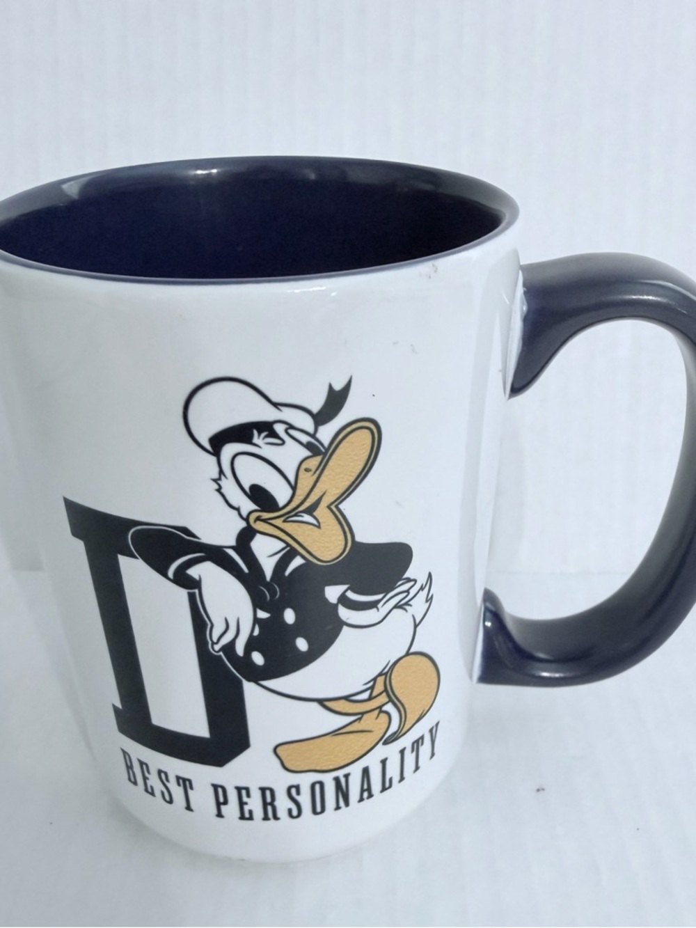 Disney White Ceramic Donald Duck Mug with Black Interior and Handle